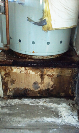 leaky water heater in Broomfield Colorado causes water damage to its own platform